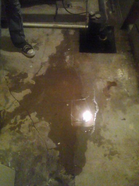 1basementwater100809 Water seeping through foundation by sump well